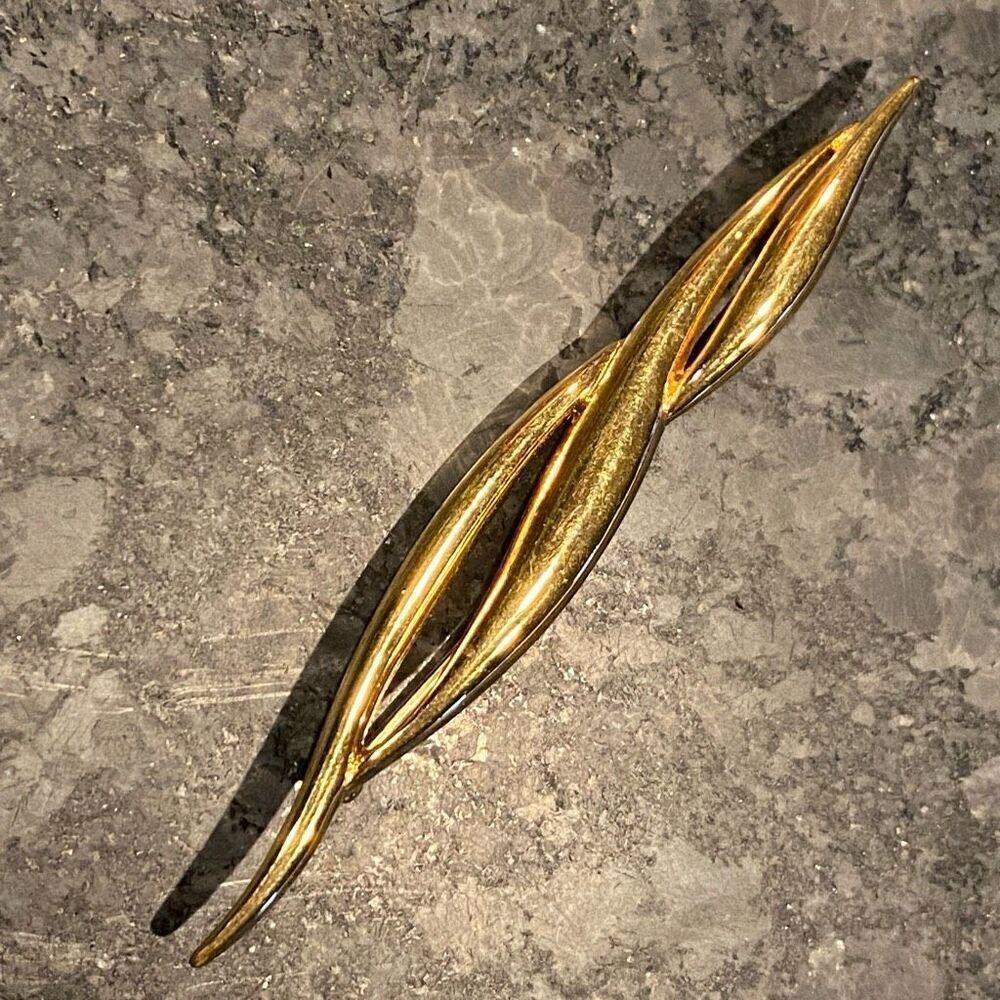 MONET GOLD TONE TWIST BAR BROOCH